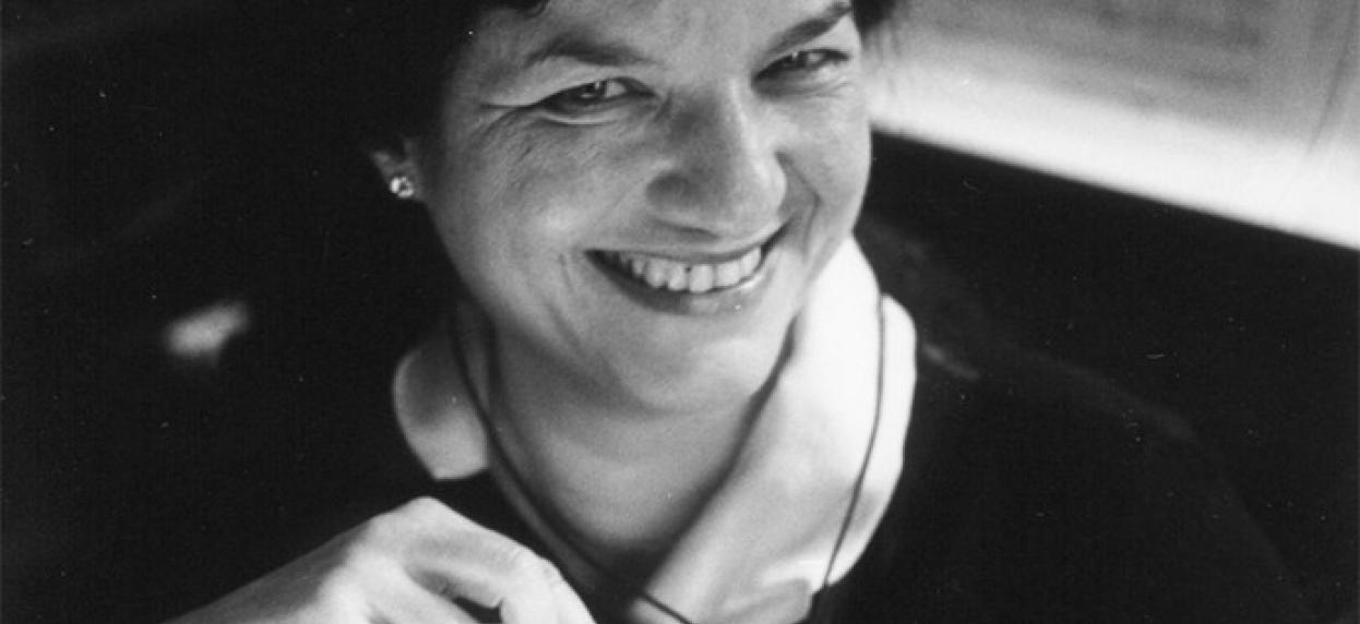 A black and white image of Pascale Criton smiling