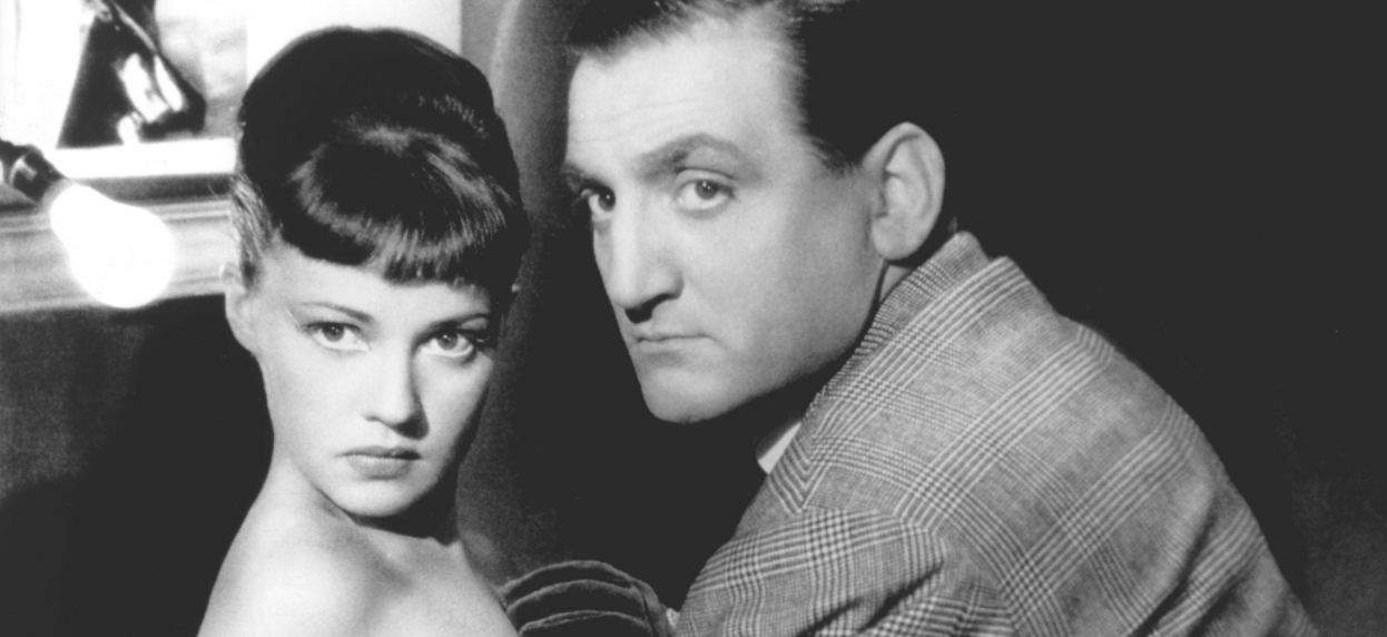Jeanne Moreau and Lino Ventura in the French movie Touchez pas au grisbi